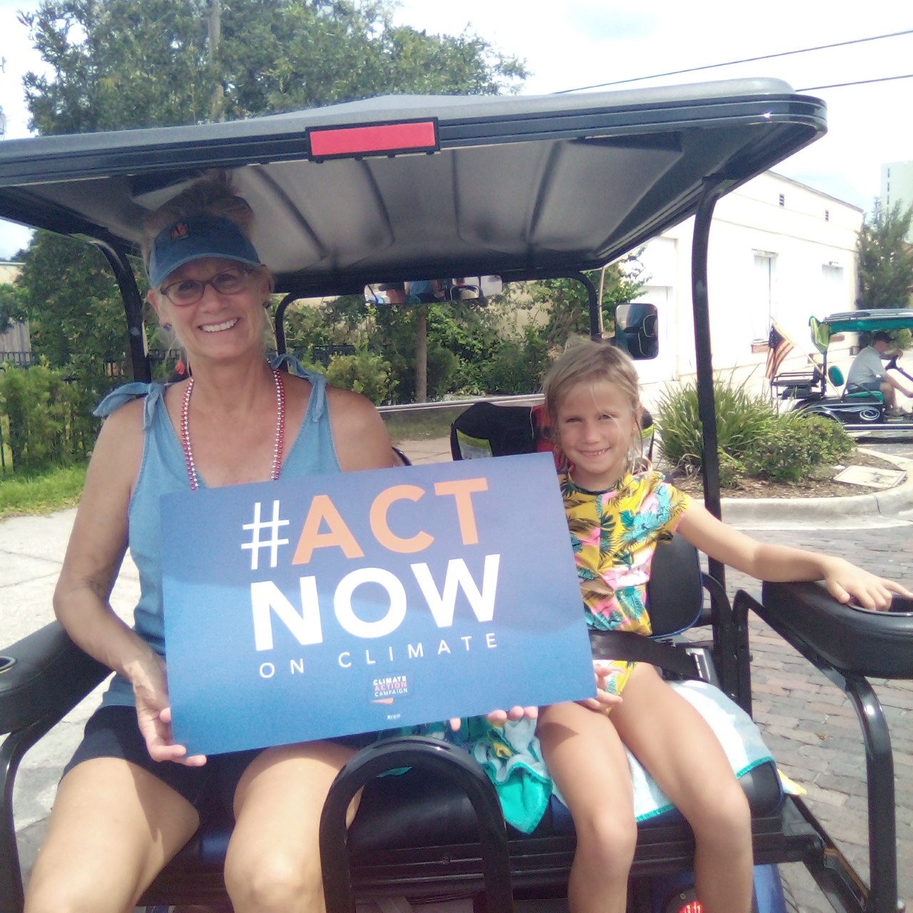 Golf cart parade for climate action in Orlando